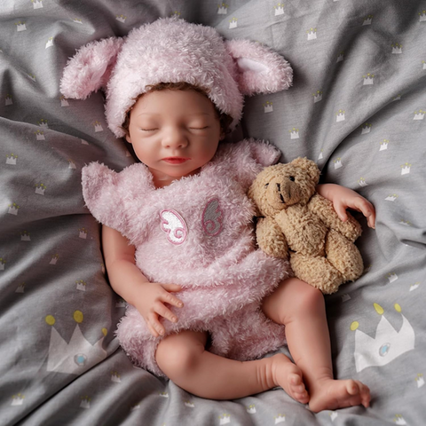 Weighted silicone reborn dolls
