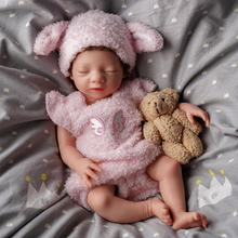 Weighted silicone reborn dolls