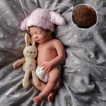 Weighted silicone reborn dolls